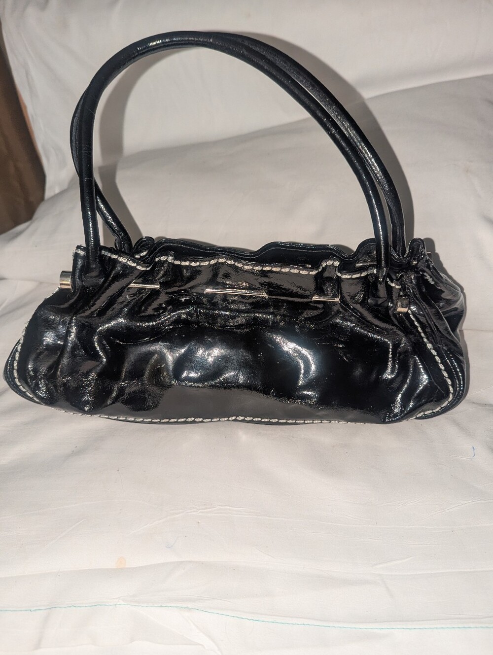 Plinio Visona Black Patent Leather Ruched Shoulder Bag with White Stitching